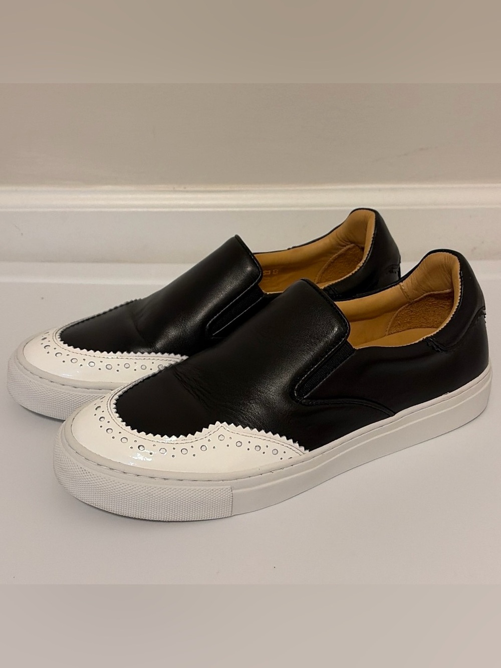 Black and White Slip-On Wingtip Sneakers for Women